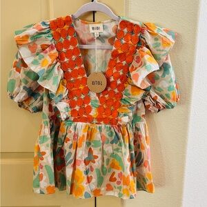BiBi Floral Ruffle Peplum Top in Orange, Mint, Coral and Yellow NWT